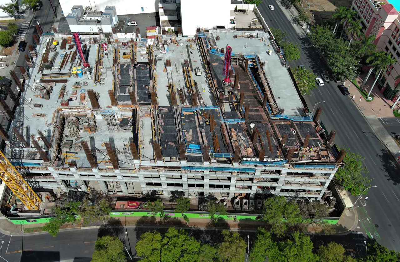 An aerial view of the parking structure under construction.
