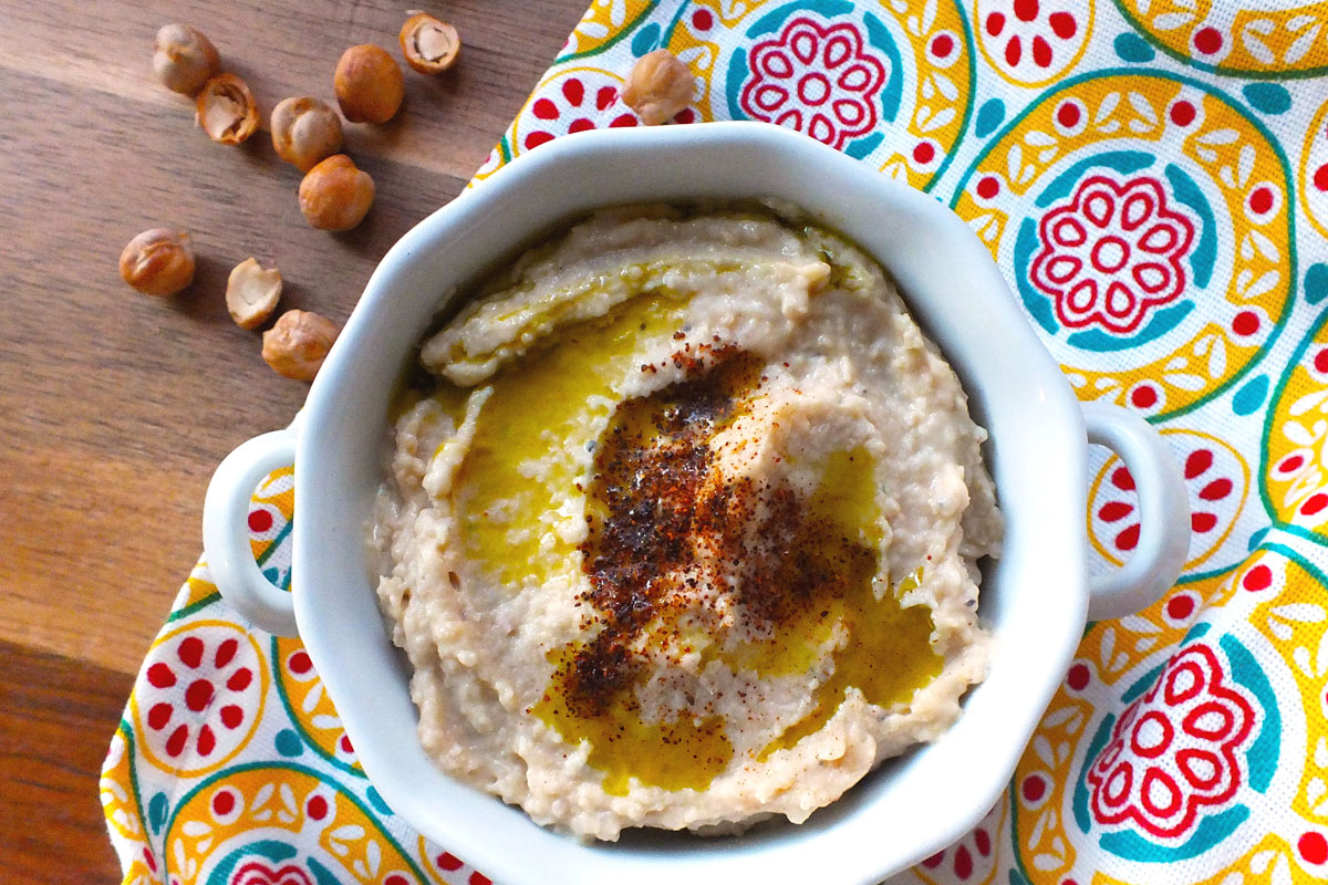 Hummus dressed with olive oil and paprika.