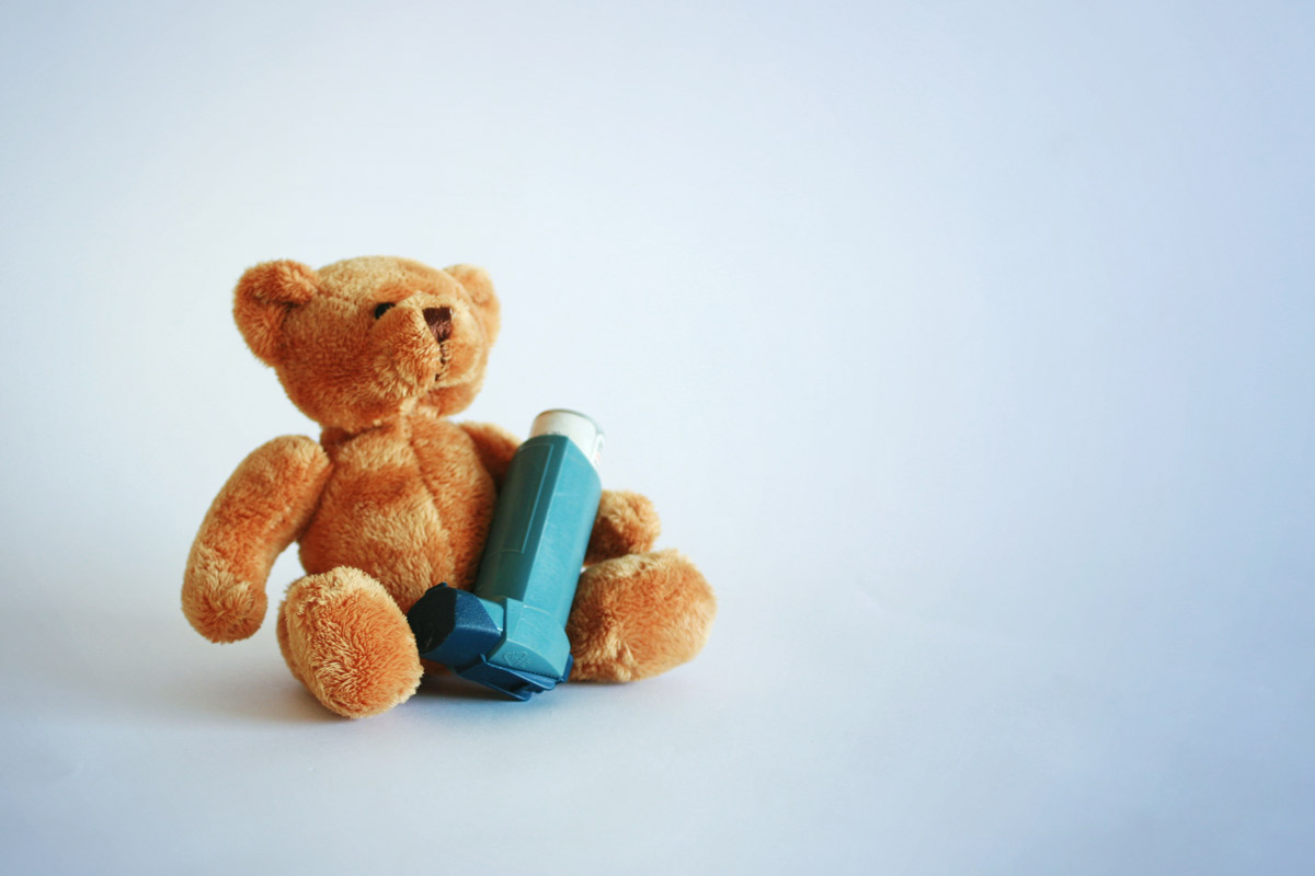 A teddy bear with inhaler.