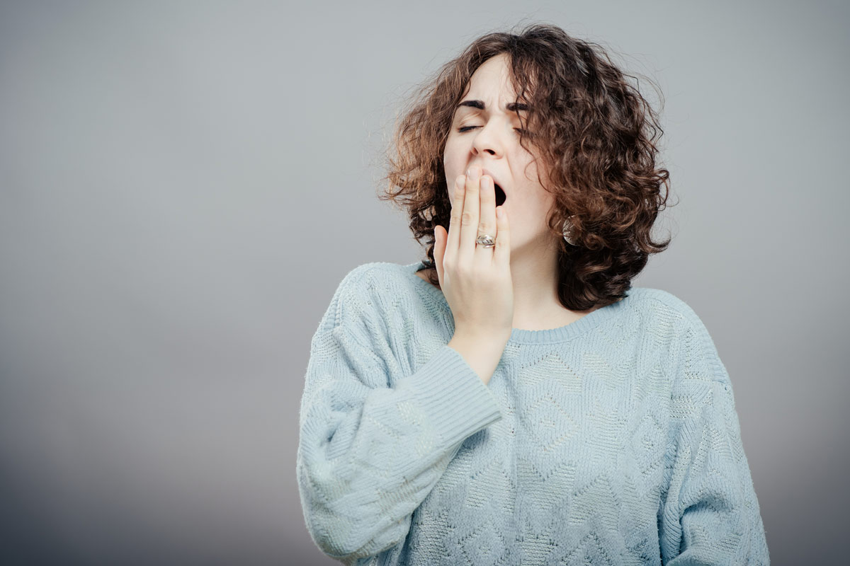 Woman yawning. 