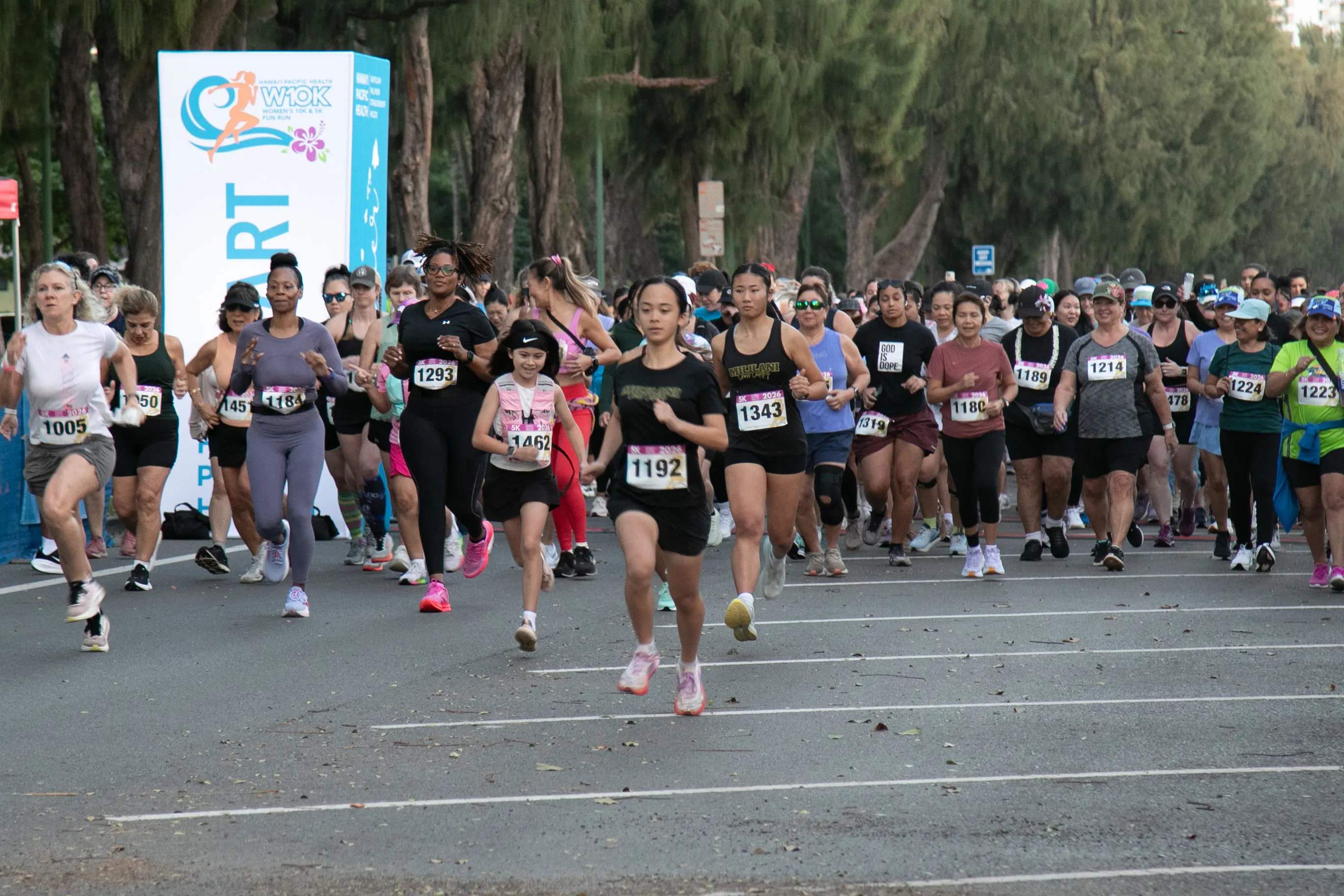 Group of 5K runners begin the race.
