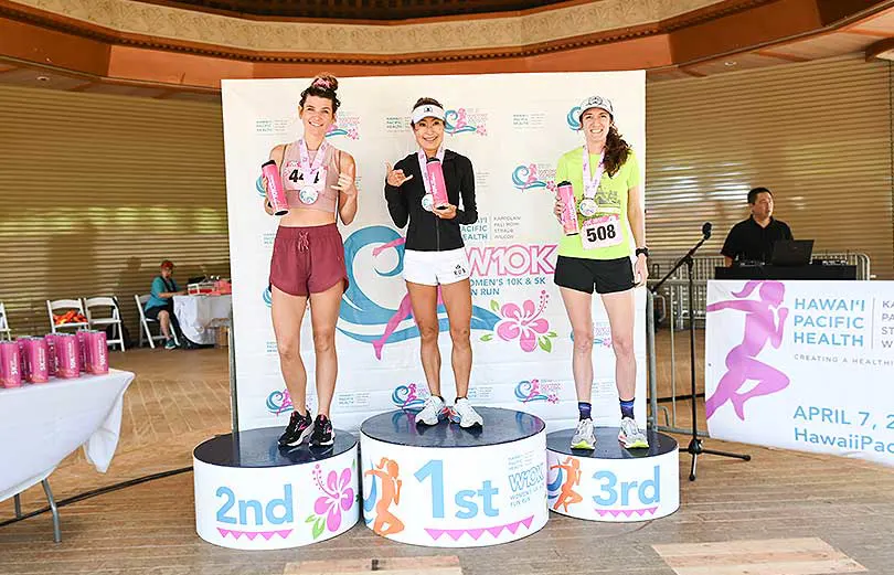 Three race winners on the awards podium.
