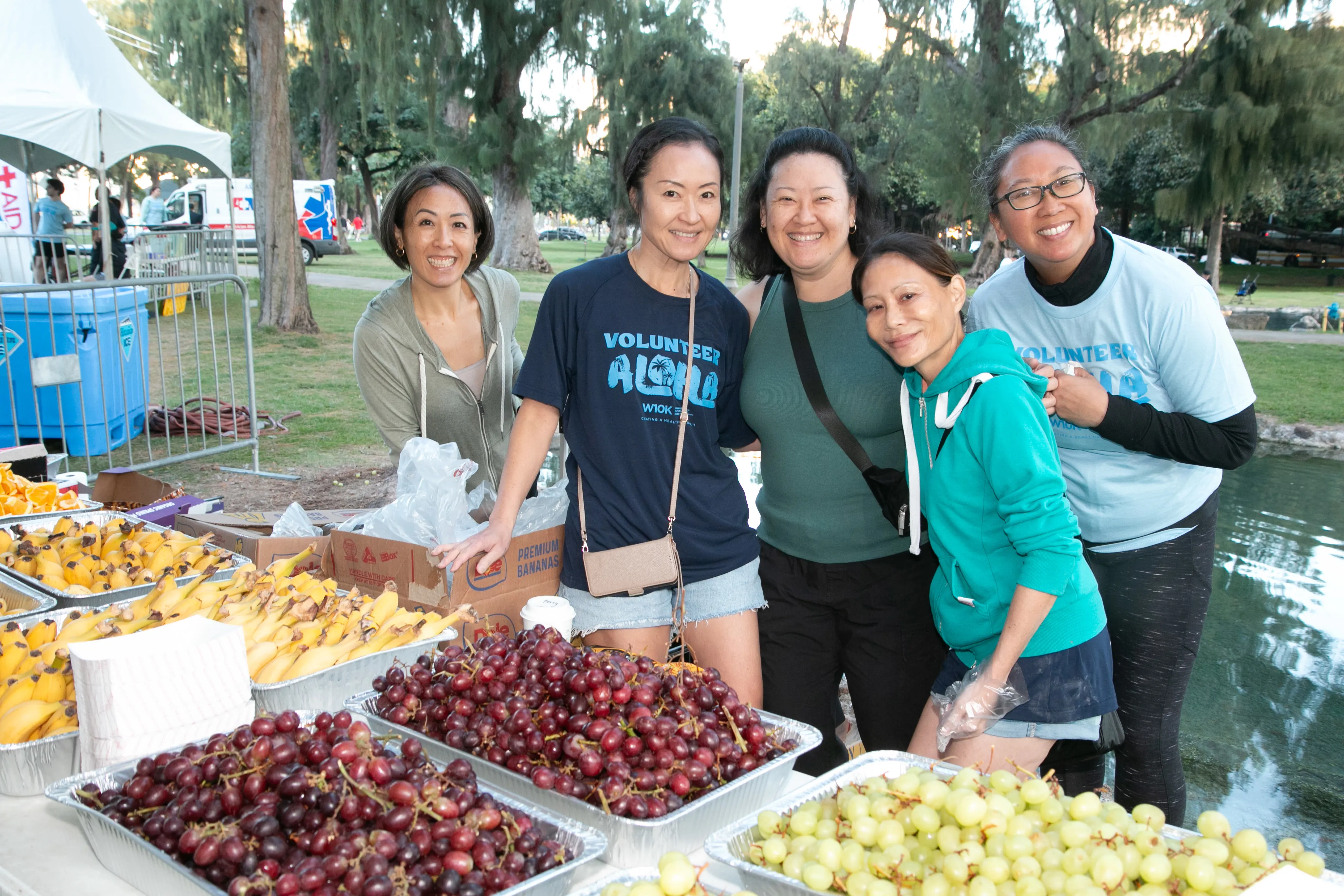 Event volunteers setting up refreshments for the race participants.