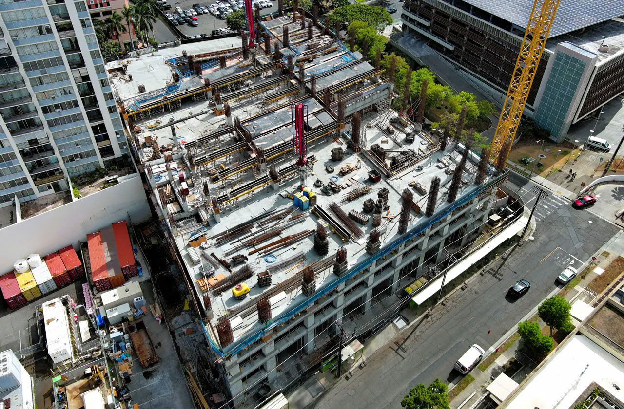 An aerial view of the parking structure under construction.