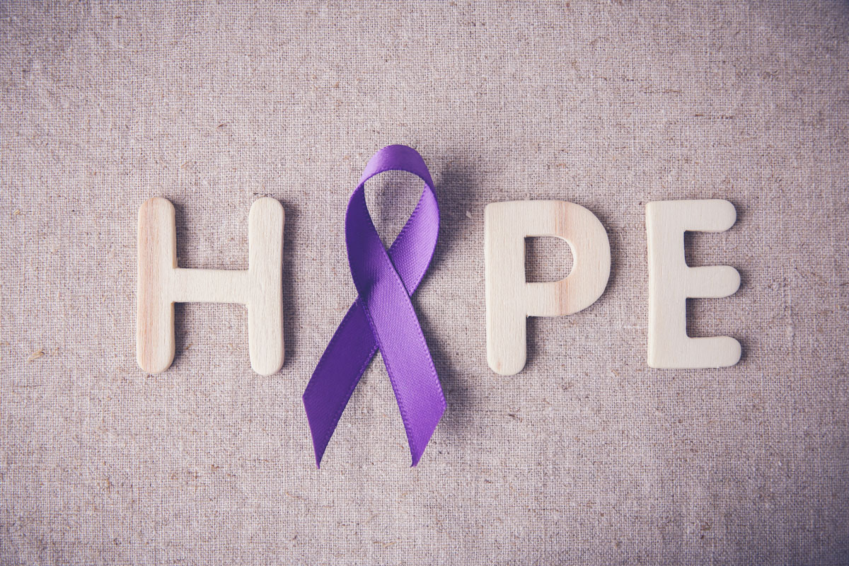 The word hope, with a cancer ribbon where the "o" would be.