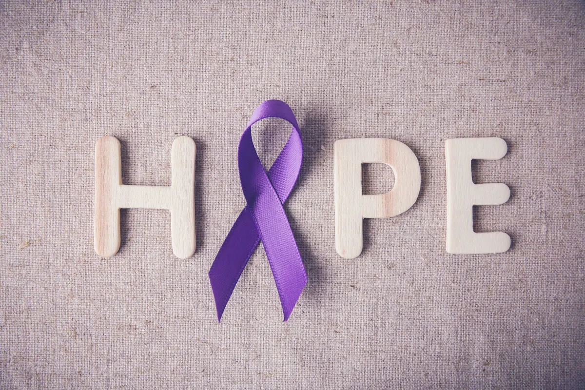 The word hope, with a cancer ribbon where the "o" would be.