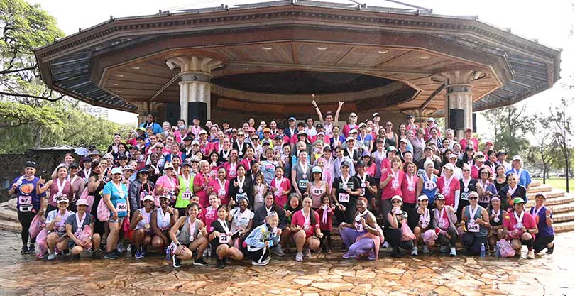 Large group of female runners and race participants of all ages.