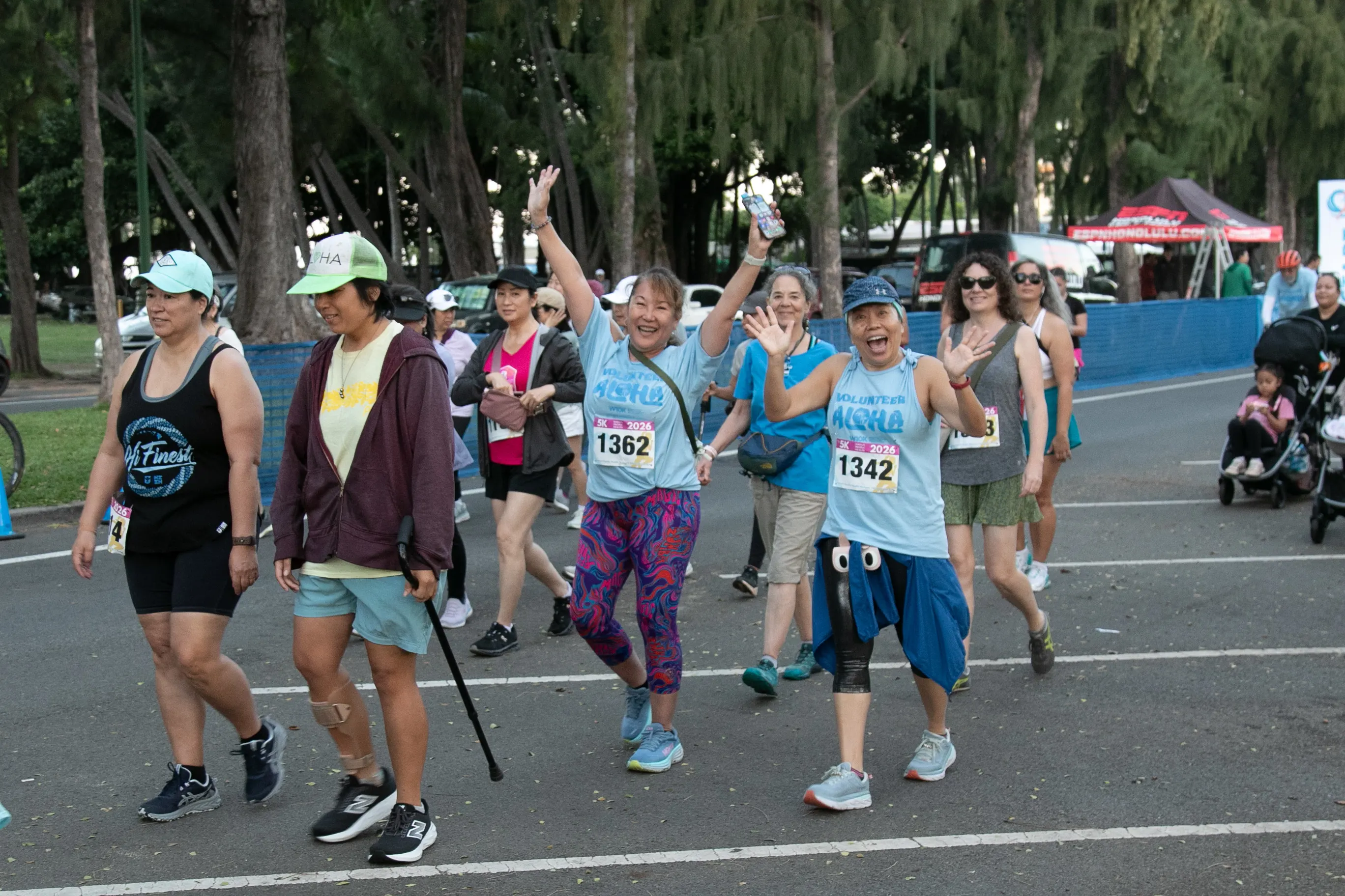 Group of 5K participants cheerfully walking the course.