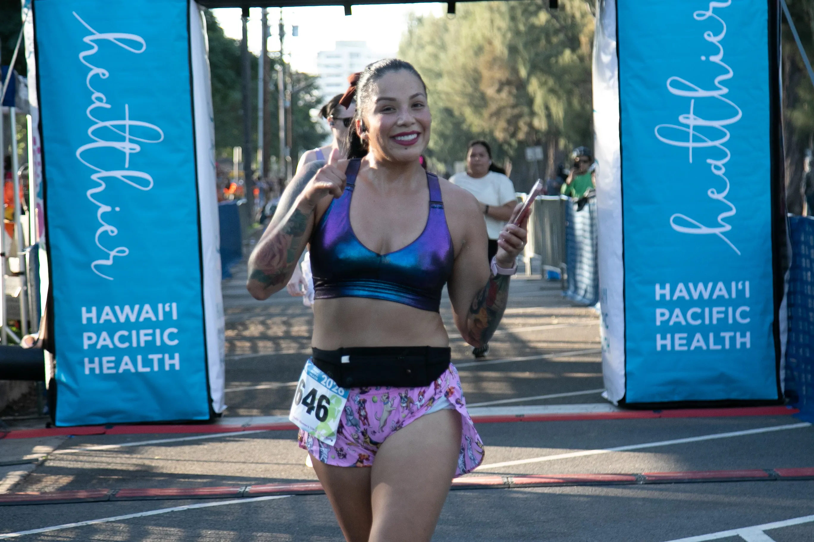 10K finisher coming through the finish line.