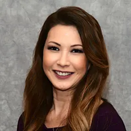 A headshot of Brooke Adachi.