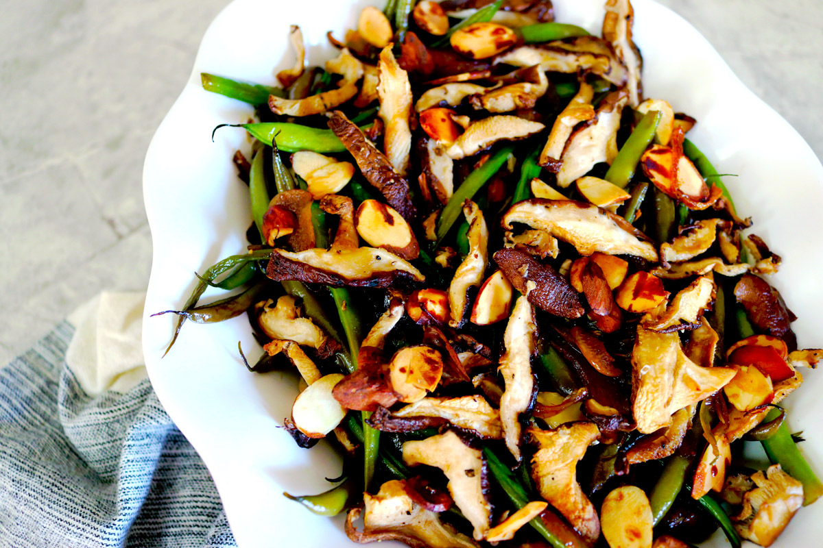 A photo of the finished recipe with lots of carmelized browns and greens from the mushrooms and beans.