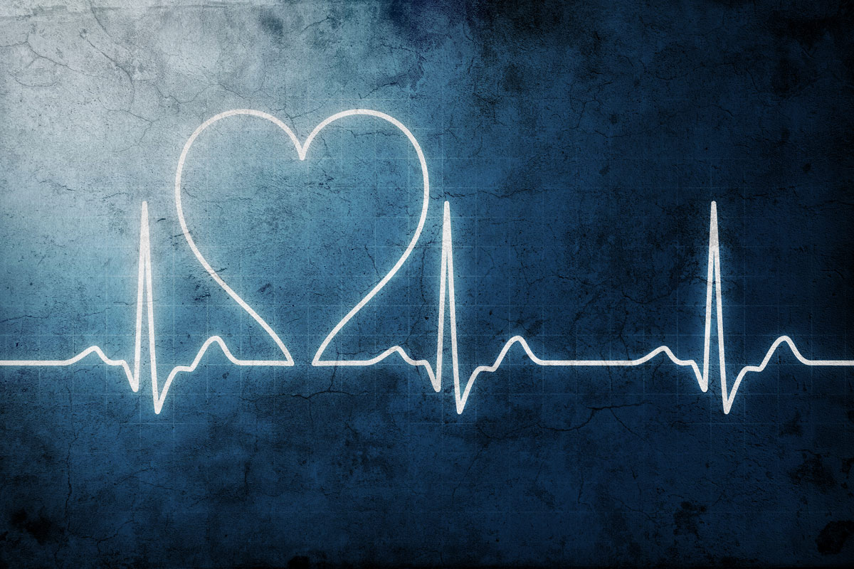 An ekg monitor with a representative heart image.