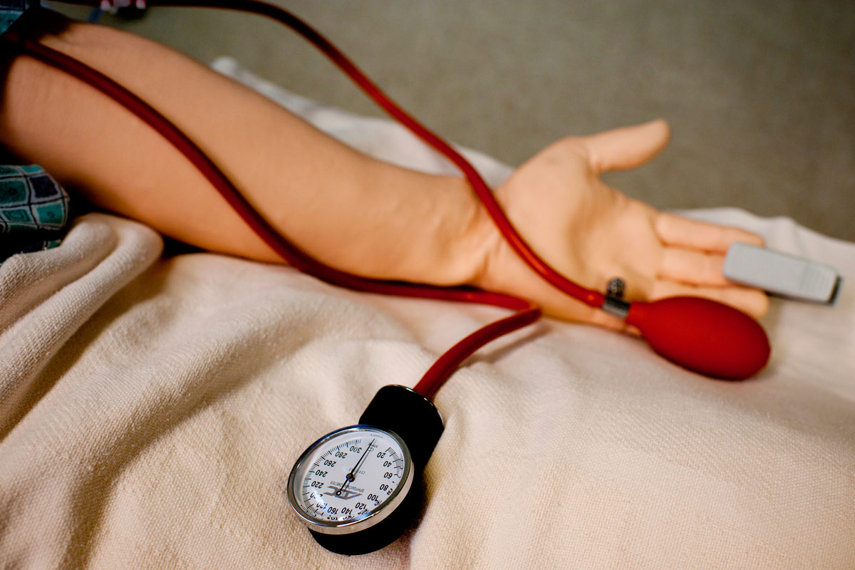 A patient getting their blood pressure checked